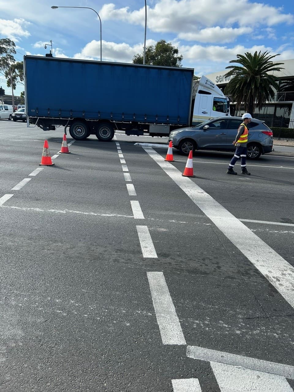 Traffic controller directing traffic on site
